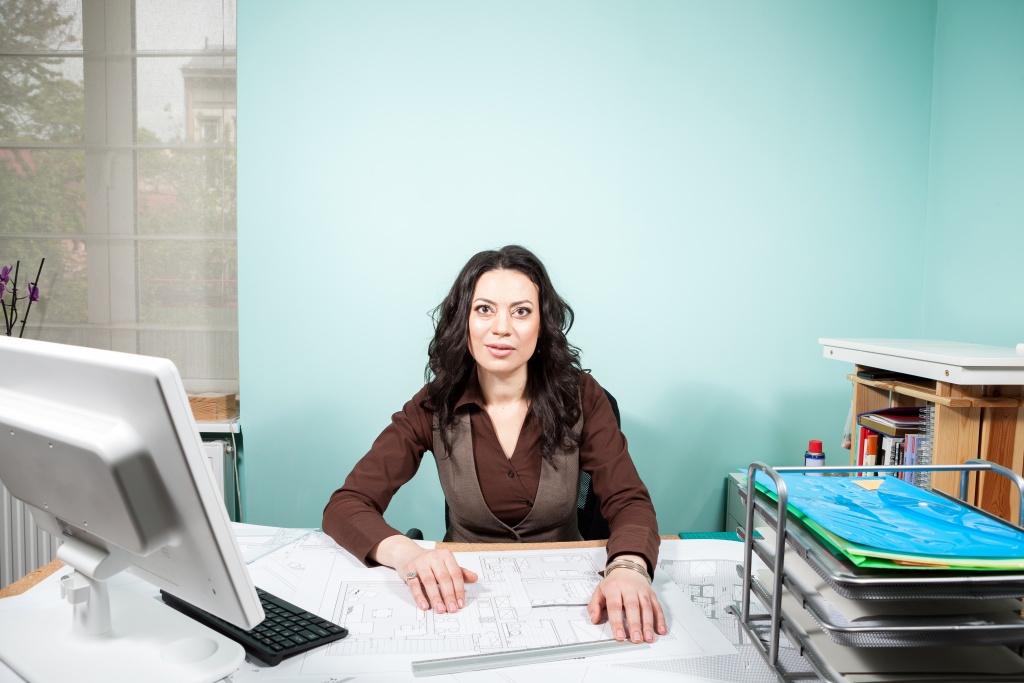architect-her-working-space-with-blueprints-front-her-working-new-projects-architecture-design.jpg женщина